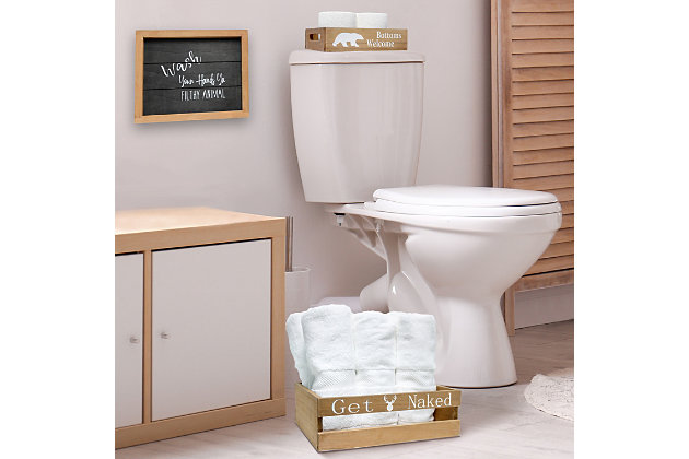 Revamp your bathroom with this three piece matching decorative set. This set will give your bathroom a complete, cohesive look. It includes 1 decorative frame, 1 toilet paper holder and 1 towel holder in a stylish, clean finish to give your bathroom the perfect update!Natural wood finish | Fun cabin/lodge themed text and images in white | Towel holder fits 6 standard bath towels comfortably. Toilet paper holder fits 2 standard size rolls comfortably. | Perfect for cabins, lodges or rustic décor homes. | Frame: 12" x 10" x 1". Toilet paper holder: 10" x 7" x 2.5". Towel holder: 14" x 12" x 4.5" | Pieces easily nest into one another for easy storage!