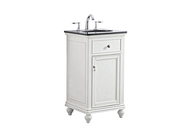 This sleekly styled single-door, granite-top bathroom vanity brings a smile of appreciation for its simple beauty and clean lines. With an authentic granite countertop with flat edge, oval porcelain sink, hand-painted antiqued white cabinet, brushed steel hardware and carved bun feet, this elegant transitional vanity balances form and function.Made of solid wood, engineered wood, porcelain and granite | Black granite countertop | Single porcelain undermount sink | Brushed steel hardware | Soft-close cabinet door | Single shelf | Faux drawer | Pre-drilled faucet holes; faucet not included | Cutout back panel for plumbing installation | No assembly required