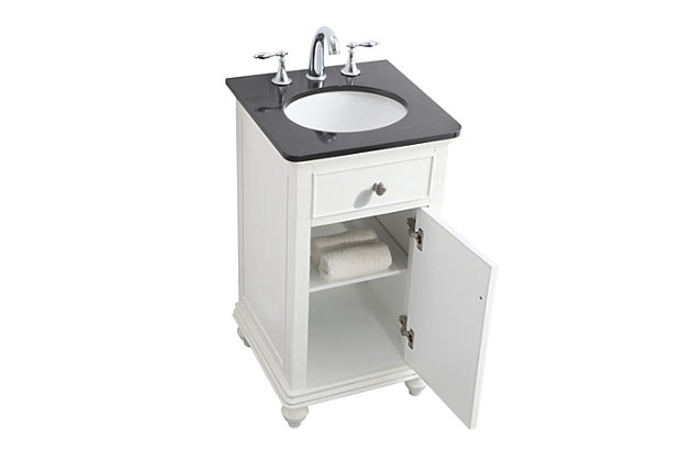 This sleekly styled single-door, granite-top bathroom vanity brings a smile of appreciation for its simple beauty and clean lines. With an authentic granite countertop with flat edge, oval porcelain sink, hand-painted antiqued white cabinet, brushed steel hardware and carved bun feet, this elegant transitional vanity balances form and function.Made of solid wood, engineered wood, porcelain and granite | Black granite countertop | Single porcelain undermount sink | Brushed steel hardware | Soft-close cabinet door | Single shelf | Faux drawer | Pre-drilled faucet holes; faucet not included | Cutout back panel for plumbing installation | No assembly required