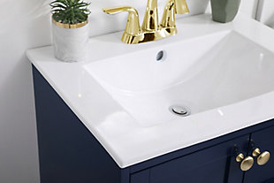 Designed with simple beauty and clean lines in mind, this bathroom vanity will surely bring a unique flair to the modern-day guest or office bathroom. Its transitional design features two framed doors and an open shelf for your additional bathroom essentials, topped with a modern white porcelain countertop with integrated sink that ensures non-stain, scratch-resistant, maintenance-free use. The wood frame cabinet with graciously curved legs is painted and accented with round goldtone doorknobs. Made of solid wood, engineered wood and porcelain | Porcelain countertop with integrated porcelain sink | Hardware with goldtone finish | 2 doors | Open shelf | Cutout back panel for plumbing installation | Pre-drilled faucet holes; faucet not included | No assembly required