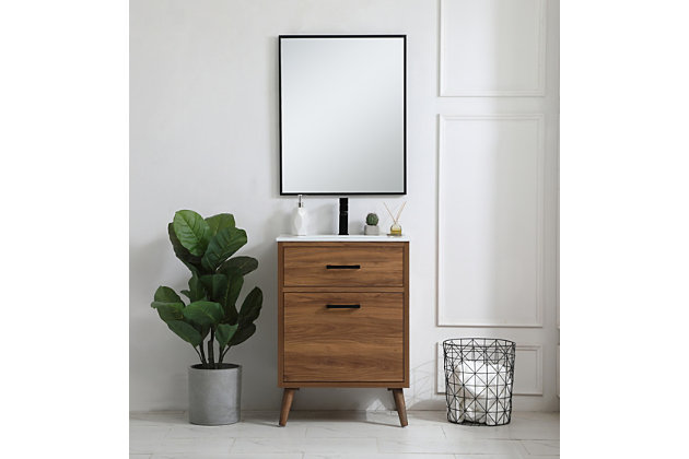Delve into a world of minimalistic fashion and contemporary styling with this mid-century modern bathroom vanity. Clean lines anchor the design, while the oblique tapered cylinder legs add subtle interest. A black handle adorns the top faux drawer, hiding the base of the integrated porcelain sink, while the bottom drawer offers storage space for bathroom necessities and toiletries. The compact size makes it the perfect vanity for any bathroom or powder room. Made of solid wood, engineered wood and porcelain | Hardware with black finish | Single integrated porcelain sink | Faux top drawer | Single smooth-gliding bottom drawer | Single cabinet door | Pre-drilled faucet holes; faucet not included | Cutout back panel for plumbing installation | Assembly required