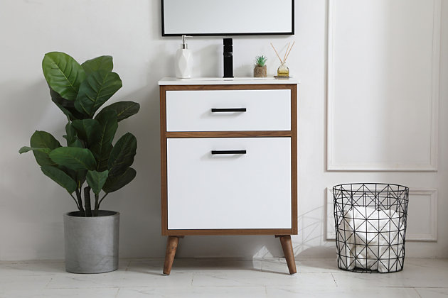 Delve into a world of minimalistic fashion and contemporary styling with this mid-century modern bathroom vanity. Clean lines anchor the design, while the oblique tapered cylinder legs add subtle interest. A black handle adorns the top faux drawer, hiding the base of the integrated porcelain sink, while the bottom drawer offers storage space for bathroom necessities and toiletries. The compact size makes it the perfect vanity for any bathroom or powder room. Made of solid wood, engineered wood and porcelain | Hardware with black finish | Single integrated porcelain sink | Faux top drawer | Single smooth-gliding bottom drawer | Single cabinet door | Pre-drilled faucet holes; faucet not included | Cutout back panel for plumbing installation | Assembly required