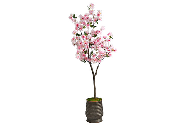 Enjoy the wonders of the majestic spring awakening with this Artificial Cherry Blossom Tree. Incredibly lifelike pink cherry blossom flowers adorn a slim, brown trunk in a rhythmic melody of pink foliage for a full look that will instantly transform your home into the best of Japan. The pink flowers have shades of white and are accented by green leaves for a feminine touch that softens spaces. Standing 5.5'  from a ribbed metal planter, curate in tight areas that want to feel pretty in pink. Perfect for bedrooms, bathrooms, awkward corners, or kitchen nooks.H: 5.5 ft. W: 23 in. D: 20 in | Incredibly lifelike faux cherry blossom tree | Bring pink foliage to spaces in need of life | Perfect for compact spaces | Housed in a ribbed metal planter