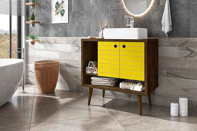 Refresh your bathroom or powder room space with the Liberty vanity. This vanity offers storage and style all at once. Beautiful splayed legs and detailed cabinet doors are seamless and versatile, easily blending with any interior design. Cabinet doors conceal shelving space to help arrange personal items, cleaning supplies and more, while a lower open shelf is great for tucking away extra toiletries, diffusers or candles. Open side storage stashes away extra supplies and displays towels, giving your bathroom that hotel feel.Freestanding vanity with sink for bathroom usage | Yellow and rustic brown finish | Made with wood | Sink made with faux marble; vessel faucet installation type | Splayed legs made with solid wood for extra durability | Includes 2 open shelves for storage and 2 doors concealing water pipes | 90-degree open door style with soft-close features and ring cutout knobs with sleek lateral line indent design | Assembly required