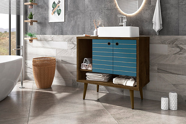 Refresh your bathroom or powder room space with the Liberty vanity. This vanity offers storage and style all at once. Beautiful splayed legs and detailed cabinet doors are seamless and versatile, easily blending with any interior design. Cabinet doors conceal shelving space to help arrange personal items, cleaning supplies and more, while a lower open shelf is great for tucking away extra toiletries, diffusers or candles. Open side storage stashes away extra supplies and displays towels, giving your bathroom that hotel feel.Freestanding vanity with sink for bathroom usage | Aqua blue and rustic brown finish | Made with wood | Sink made with faux marble; vessel faucet installation type | Splayed legs made with solid wood for extra durability | Includes 2 open shelves for storage and 2 doors concealing water pipes | 90-degree open door style with soft-close features and ring cutout knobs with sleek lateral line indent design | Assembly required