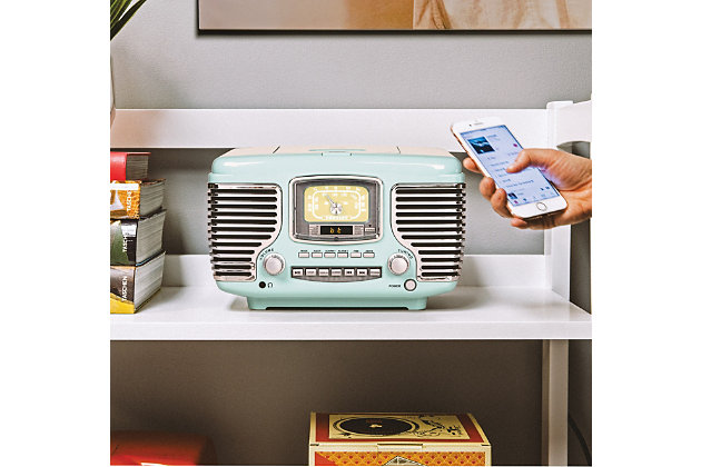Get behind the wheel of your musical road trip with the corsair radio! Look under the hood to pop in a cd, or tune the am/fm radio on this color and chrome chassis. Get on the road on time with a built-in alarm clock with dual alarms. The dynamic stereo speakers and built-in bluetooth receiver under the grill are enough to get anyone’s wheels spinning in the morning!Built-in bluetooth receiver | Cd player | Built-in full-range stereo speakers | Alarm clock | Analog tuner | Headphone jack