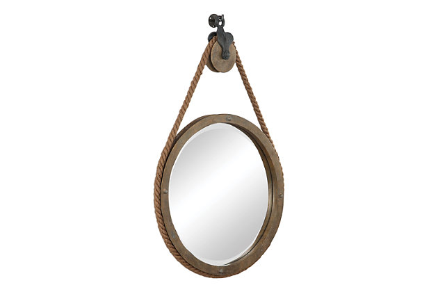 The Melton mirror's rustic design features an aged natural wood finish with exposed nailhead accents, and thick rope detailing that surrounds the mirror's frame. The mirror is hung using an antique-inspired pulley with aged black detailing and a matching aged black decorative hanging hook. This round mirror incorporates a generous 1-inch bevel.Resin, glass, wood products and other, metal | Made with resin, mirrored glass, metal and wood | Aged natural wood finish with exposed nailhead accents and thick rope detailing | Hung using antique-inspired pulley with aged black detailing and matching decorative hanging hook | 1" bevel | Ready to hang