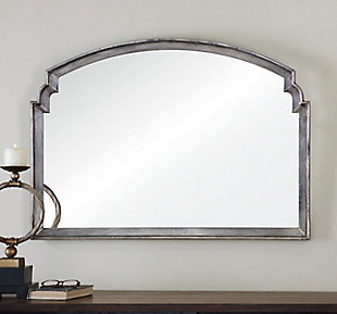 With its subtle arch design, the Via Della mirror is a contemporary staple. The frame is finished with a trendy, lightly antiqued silvertone leaf.Wood products and other | Made with wood | Contemporary style | Subtle arch design | Finished with lightly antiqued silvertone leaf | Ready to hang