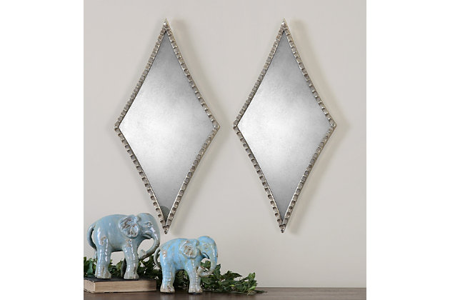 Achieve traditional style with a dash of drama with the Gelston mirror. The metal frame features a scalloped profile finished in oxidized, plated silvertone accented with an antiqued mirror.Metal | Made with metal | Scalloped profile | Finished in oxidized plated silvertone | Accented with antiqued mirror | Ready to hang
