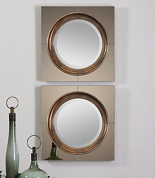 The contemporary Gouveia mirror features antiqued outer mirrors surrounding a center frame, which is finished in a heavily antiqued goldtone. The mirror is also beveled.Wood products and other | Made with wood | Outer antiqued mirrors surround a center frame | Frame finished in a heavily antiqued goldtone | Beveled mirror | Ready to hang