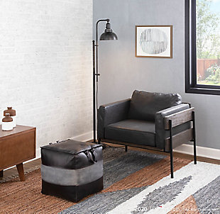 Farmhouse yet luxe, the Kari Chair by LumiSource is a stunning complement to any living room. The wood panel accent and black metal frame contrast a beautifully upholstered seat and backrest. Sit back and relax for hours in the thick seat and back cushions. Available in faux leather or woven fabric upholstery.Stylish faux leather upholstery | Unique wood and metal design | Cushioned seat and backrest | Black metal base | Assembly required