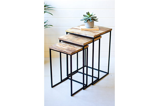 Crafted of mango wood and an open black iron frame, this set of three nesting tables will give your space a sleek and stylish update.Large: 16" x 16" x 24",  medium: 14" x 14" x 22"t;  small: 12" x 12" x 20"t | Color: brown | Made of wood & iron | Natural finish | Accent furniture | Made in india | Wipe clean with dry cloth
