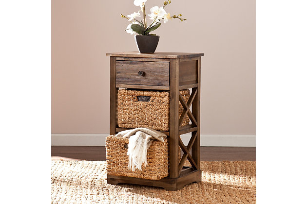 The Jayton basket storage shelf sure makes being organized look easy-breezy. Great for clothes and the perfect catchall for toys, towels and bathroom essentials, the pair of water hyacinth baskets and smooth-gliding drawer are a natural fit. With its coastal cool vibe, the driftwoody distressed finish goes with the flow.Made of acacia wood, engineered wood, acacia veneer, water hyacinth and metal | Distressed finish | 2 woven storage baskets | 1 smooth-gliding drawer | Antiqued bronze-tone knob | Assembly required | Assembly time frame is 15 to 30 min.