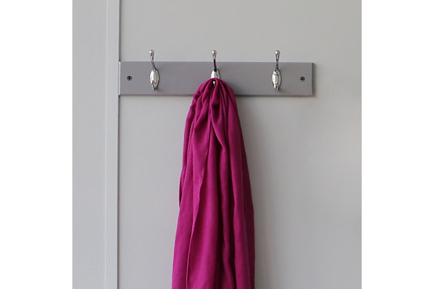 If you’re looking for a compact solution, to organize all your essentials this hook rail is a perfect match for you. The rail measures 15.75 inches long and 2.75 inches wide, just large enough to line up and organize all your essentials without taking up too much wall space. Place by the front door as a dropping zone for every member of your family to store their house and car keys. The hook rail is a great addition to a bare wall in the entryway, collecting coats from your guests as they enter your home. Or use in the bathroom to keep spare towels within reach. With its dual hook design the rack allows you to double your holding capacity of your most important items. Each hooks measures .75 inches, by 2.75 inches, and is 3 inches high and are perfectly spaced at 3.75 inches apart. It comes complete with screws and screw covers, so you can quickly install the unit as soon as you open it from its packaging. To install the unit, screw the walls into the two mounted holes. Each hook can hold a maximum of approximately 5 lbs. From modern to industrial or anything in between, this stylish hanging rack will make an excellent addition no matter the décor. Item dimensions may differ slightly due to the unique nature of the product. Color and finish may also differ slightly from the images shown due to differences in monitor displays. Drill and screw driver is not included. Props and accessories are not included.Dual hooks with a deep curve design gives you doubles the hanging capacity for storing more of your essential items, like hats, jackets, coats, keys, scarves, and leashes | Size of hook: 0.75” x 2.75”/1.9 x 6.98 cm, distance between hooks: 3.75” | Mounting holes allow you to secure the rack to the wall; sleek design perfect for adding stylish storage to a blank wall in the entryway, foyer, hallway, bathroom, bedroom | Made with a high quality, solid mdf base with durable steel hooks the entire hook rail can support a total weight capacity of up to 15 lbs. | Size of rail: 15.75” x 2.75”/ 40 x 6.98 cm, weight capacity per hook: 5 lbs. | Easy assembly with screws and screw covers included to make installation a breeze