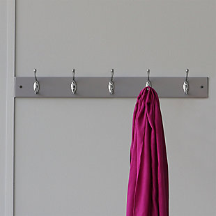 If you’re looking for a compact solution, to organize all your essentials this hook rail is a perfect match for you. The rail measures 27 inches long and 2.75 inches wide, just large enough to line up and organize all your essentials without taking up too much wall space. Place by the front door as a dropping zone for every member of your family to store their house and car keys. The hook rail is a great addition to a bare wall in the entryway, collecting coats from your guests as they enter your home. Or use in the bathroom to keep spare towels within reach. With its dual hook design the rack allows you to double your holding capacity of your most important items. Each hooks measures .75 inches, by 2.75 inches, and is 3 inches high and are perfectly spaced at 3.75 inches apart. It comes complete with screws and screw covers, so you can quickly install the unit as soon as you open it from its packaging. To install the unit, screw the walls into the two mounted holes. Each hook can hold a maximum of approximately 5 lbs. From modern to industrial or anything in between, this stylish hanging rack will make an excellent addition no matter the décor. Item dimensions may differ slightly due to the unique nature of the product. Color and finish may also differ slightly from the images shown due to differences in monitor displays. Drill and screw driver is not included. Props and accessories are not included.Dual hooks with a deep curve design gives you doubles the hanging capacity for storing more of your essential items, like hats, jackets, coats, keys, scarves, and leashes | Size of hook: 0.75” x 2.75”/1.9 x 6.98 cm, distance between hooks: 3.75” | Mounting holes allow you to secure the rack to the wall; sleek design perfect for adding stylish storage to a blank wall in the entryway, foyer, hallway, bathroom, bedroom | Made with a high quality, solid mdf base with durable steel hooks the entire hook rail can support a total weight capacity of up to 25 lbs. | Size of rail: 27” x 2.75”/ 68.58 x 6.98 cm, weight capacity per hook: 5 lbs. | Easy assembly with screws and screw covers included to make installation a breeze