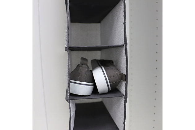 Bring an end to cluttered floors and make use of vertical space in the closet with this hanging closet organizer. Open style compartments allow you to easily see items at a quick glance. The sturdy metal hooks can be used on closet rods or a rack. Perfect for seasonal and long term storage, this hanging organizer will make a great addition for a home, condo, apartment, and dorm. Transform a messy closet into an organized oasis. Or free up more room in your drawers with this hanging organizer. With the soft fabric design, it's a great way to provide gentle and safe storage from your wardrobe and other necessities. Additionally, the unit features outward seams that prevent snagging when pulling clothes from each shelf. Item dimensions may differ slightly from actual product due to manual measurement. Color and finish may differ slightly due to differences in monitor displays. The unit is easy to clean simply wipe with a dry cloth. Spot clean.Open cubby style shelves for easy access to items | Velcro strap with thick metal hooks to secures to the closet rod | Folds flat for space-saving storage | Made of breathable non-woven material with decorative herringbone pattern