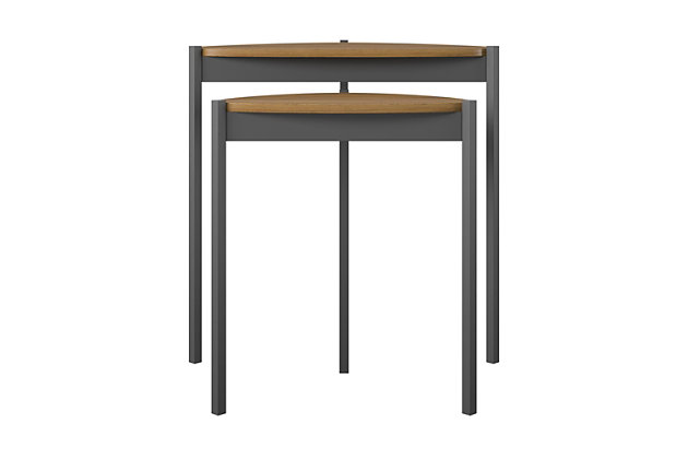 Add unique and space-saving table space to your living room with the Novogratz Tallulah Nesting Tables. Made of laminated particleboard with sturdy powder-coated metal legs, the warm walnut woodgrain finish on the tabletops pairs perfectly with the dark gray metal legs for a beautiful look for your space. Use the tables separately to hold all of your drinks and snacks for movie or game night and simply stack them together when not in use to save valuable space. The compact design is perfect for first apartments and smaller spaces. The unique tabletop shape is sure to make the tables stand out and complement your style. The Nesting Tables ship flat to your door and require minimal assembly upon opening. Once assembled, the taller table measures to be 24"H x 23.8"W x 15.7"D and the shorter table measures to be 20.9"H x 17.7"W x 11.3"D.Get space-saving table space for your room with the novogratz tallulah nesting tables | Made of laminated particleboard with sturdy powder-coated metal legs, the warm walnut woodgrain finish on the tabletops pairs perfectly with the dark gray metal legs | Get additional table space for snacks, remotes, and drinks by using the 2 tables as convenient end tables | Stack the tables together to save space and still be able to use the taller table for essentials | The nesting tables ship flat to your door and require minimal assembly upon opening. The taller table can hold up to 20 lbs. While the shorter table can hold 15 lbs. Assembled taller table dimensions: 24"h x 23.8"w x 15.7"d. Assembled shorter table dimensions: 20.9"h x 17.7"w x 11.3"d | 1 year limited warranty included
