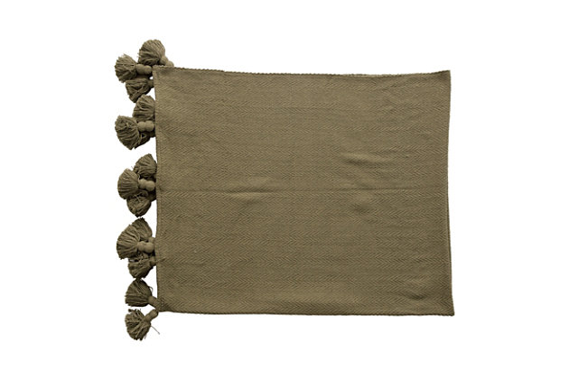 This woven cotton throw looks great over any couch or chair. Featuring a beautiful olive color with fun oversized tassels, this piece seamlessly adds both comfort and style to any seat. Its neutral color makes it perfect for blending in with any type of decor, and great for curling up withThis woven cotton throw looks great resting on couches and chairs, and features a beautiful olive color with oversized tassels | Made out of woven cotton | Perfect for any style home | Perfect for throwing over couches or chairs for both added style and comfort | 100% cotton