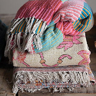 This woven recycled cotton blend throw looks great over any couch or chair. Featuring a fun multi-colored stripe pattern with tassels, this piece seamlessly adds both comfort and style to any seat. Its bold pattern makes it perfect for blending in with eclectic decor, and is great for curling up withThis woven recycled cotton blend throw looks great resting on couches and chairs, and features a fun multi-colored stripe pattern with tassels | Woven recycled cotton blend | Perfect for an eclectic home | Perfect for throwing over couches or chairs for both added style and comfort | 52% cotton, 30% polyester, 5% acrylic, 5% rayon, 5% nylon, 3% other fiber