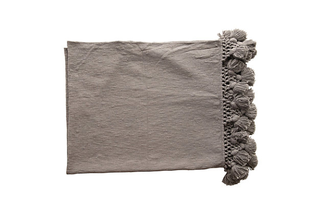 This cotton blend throw looks great over any couch or chair. Featuring a beautiful dusty blue color and crocheted tassels, this piece seamlessly adds both comfort and style to any seat. Its muted coloring makes it perfect for blending in with any decor, and is great for curling up withThis cotton blend throw looks great resting on couches and chairs, and features a beautiful dusty blue color with crocheted tassels | Cotton blend throw | Perfect for any style home | Perfect for throwing over couches or chairs for both added style and comfort | 100% cotton