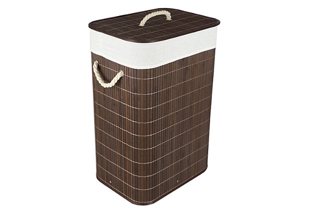 Crafted from all natural bamboo, this Home Basics Hamper is a beautiful way to  store your laundry. The rich, chocolate brown finish provides an enchanting contrast to rooms that incorporate neutral and pastel tones. Aside from it's eye-catching design, it provides plenty of room to tuck away a large load of loundry.  Display it in the corner of the bathroom or laundry room to promote a serene atmosphere you and your guests will enjoy.Made of bamboo | Holds up to 2 loads of laundry | Includes a removeable and washable liner | Collapsible design for easy, quick storage | Measures 16" x 12" x 23" | Spot clean for easy maintenance | Pair this piece with our line of mesh intimate bags and dryer balls to keep your laundry squeaky clean and snag-free