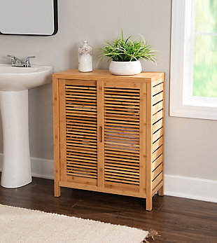 Make your bathroom feel more like a personal spa with the Bracken two door floor cabinet. Crafted from solid bamboo, this naturally beautiful cabinet is both sturdy and simply striking. Pair of doors slide to reveal a trio of interior shelves perfect for storing towels and essentials.Made of solid bamboo | 2 sliding cabinet doors | 3 interior shelves | Assembly required