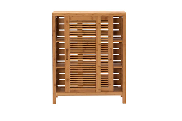 Make your bathroom feel more like a personal spa with the Bracken two door floor cabinet. Crafted from solid bamboo, this naturally beautiful cabinet is both sturdy and simply striking. Pair of doors slide to reveal a trio of interior shelves perfect for storing towels and essentials.Made of solid bamboo | 2 sliding cabinet doors | 3 interior shelves | Assembly required