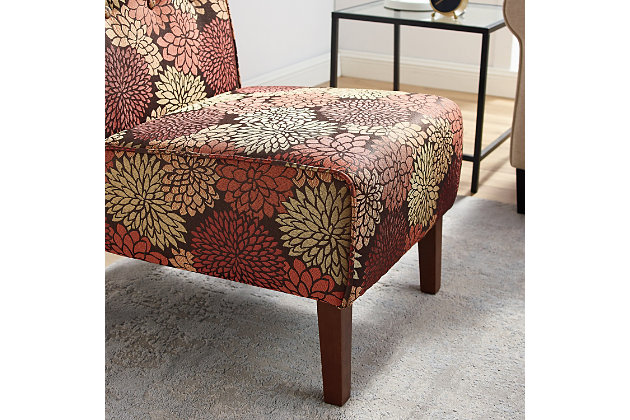 Even if you’re short on space, you can still be sitting pretty with the Coco accent chair. Simple and streamlined, this chair’s armless design won’t cramp your style. Its botanical patterned upholstery in rich harvest hues is a breath of fresh air.Sturdy hardwood frame | Microfiber upholstery | Ca fire foam cushion | Button tufted seat | Exposed legs with dark walnut finish | Assembly required
