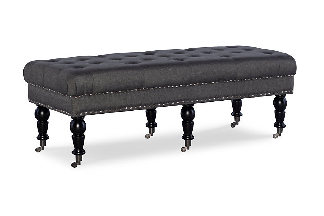 The richly styled Isabelle bench is sure to bring sophistication and a touch of romance to a bedroom, living room or entryway. Deep tufting enhances the bench’s charcoal linen fabric, while classically turned legs in a black finish are a stri complement. Casters make it easy to enjoy.Made with solid birch wood | Polyester linen upholstery | Ca fire foam cushion | Tufted seat | Silvertone nailhead trim | Casters for easy mobility | Exposed legs with black finish | Assembly required