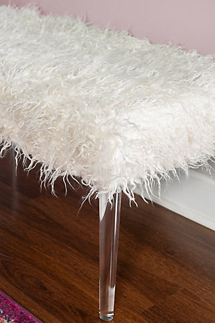 Indulge in affordable luxury. The fabulous faux flokati bench brings instant glamour to your space. Ultra plush white flokati seat paired with clear acrylic tapered legs makes such a flirty fashion statement. Perfect as a bench or ottoman. Place at the foot of your bed…in an entryway…anywhere wow factor is welcome.Made of wood with clear acrylic legs | Faux flokati fabric | Foam cushion | Assembly required