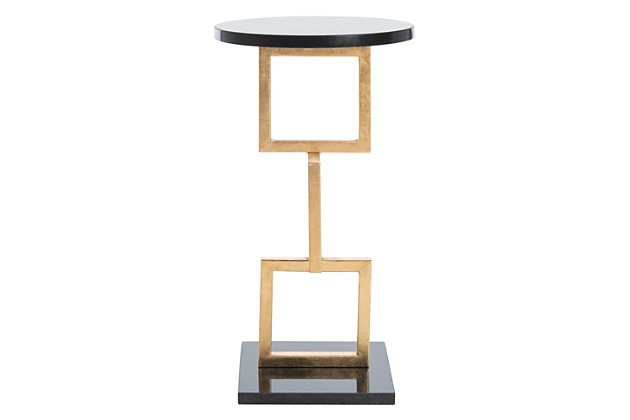 Statuesque and stylish, the Cassidy Accent Table pays homage to modern sculpture. Crafted with a gold-leafed iron base and black marble tabletop, it's a perfect addition to transitional and modern rooms.Goldtone finish | Made of iron and marble | No assembly required