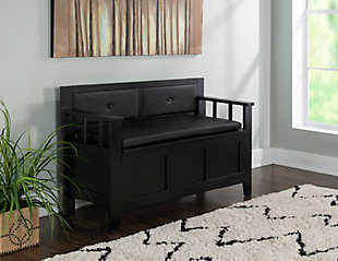 Merging form, function and comfort, the Carlton padded storage bench in black offers so much bang for the buck. Padded vinyl seat flips open to an ample storage compartment that houses everything from backpacks and umbrellas, to shoes and sports gear.Made of chinese hardwood, engineered wood and plywood with vinyl padded seat | Black finish | Flip top with hinges opens to storage compartment | Assembly required