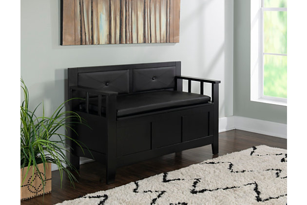 Merging form, function and comfort, the Carlton padded storage bench in black offers so much bang for the buck. Padded vinyl seat flips open to an ample storage compartment that houses everything from backpacks and umbrellas, to shoes and sports gear.Made of chinese hardwood, engineered wood and plywood with vinyl padded seat | Black finish | Flip top with hinges opens to storage compartment | Assembly required