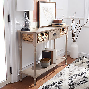 From coastal cottage to rustic lodge, the country-styled Christa Console in vintage white pine lends welcoming charm to any entry hall, and also makes a wonderful focal wall in a living or family room. With rattan weave drawers and a lower shelf, this piece is ideal for both storage and display.Rattan weave drawers; lower shelf | Assembly required | Water-based paint