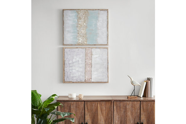 Bring some shimmer to your wall decor collection with this stunning set of "Flatland" glitter canvas art prints. Each canvas features an abstract design in soft blue and natural hues for a chic contemporary look. You'll love how these beautiful canvas prints look in your space.Set of 2 | Made of engineered wood, paper, canvas, acrylic and glitter | Gray, blue, white and goldtone | Framed | Hand-embellished glitter | Ready to hang (D-ring hangers) | Indoor use only | Imported