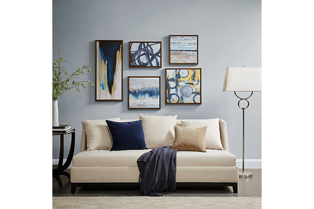 Turn your wall into a contemporary art gallery with this canvas wall art set. Featuring five different abstract pieces of artwork in various shades of blue, this set can be arranged in a variety of ways to create an eye-catching display in your living space. Each piece is assembled onto a deco box for structure and finished with a bronze-tone frame for a clean edge and gallery-ready look.Set of 5 | Made of polystyrene, engineered wood and canvas | Blue, white and taupe with textured gel coating | Goldtone foil embellishment | Box frame with bronze-tone finish | Indoor use only | Ready to hang | Imported