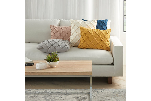 Celebrate your unique style with the fashionable flair of the kathy ireland® home studio collection. This delightfully textured throw pillow is crafted in delicate hues, with a gathered and pintucked cover for an irresistibly touchable effect. Soft and comfy, it's an eye-catching embellishment for your bed or sofa.Made of 100% cotton | Handcrafted | Soft polyfill | Zipper closure | Imported | Spot clean