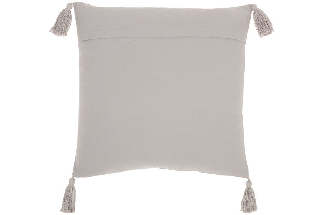 Toss a touch of casual elegance onto your bed or sofa with this handcrafted throw pillow from the kathy ireland® home studio collection. Its unique detailing features a modern, linear pattern of metallic embroidered stripes and chevrons, with the added appeal of tasseled corners. Wherever you place it, you're sure to enjoy the casual charm and eye-catching embellishment of this fun and fashionable pillow design.Made of 100% cotton | Handcrafted | Soft polyfill | Zipper closure | Imported | Spot clean