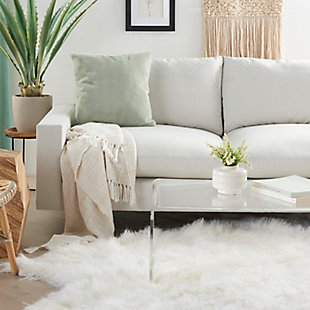 It’s hip, it’s sophisticated, it’s fun, and it’s fluffy. This throw pillow from mina victory home accents is just what you want for a fresh, stylish touch on a favorite sofa, chair or bed. Handcrafted of faux rabbit fur, the plush pillow has irresistible texture and is fully furred on both sides for luxurious lounging.Made of polyester and faux fur | Handcrafted | Soft polyfill | Imported | Spot clean