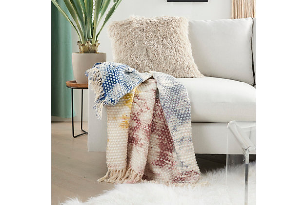 Toss a fresh look onto your modern home decor with this handcrafted, multicolored abstract throw blanket from mina victory, in a fun and funky tie-dye pattern. It's generously sized for comfort to drape gracefully on a sofa or chair, or to fold at the foot of your bed. Fringed edges make the perfect finishing touch.Made of 100% cotton and acrylic | Handcrafted | Imported | Spot clean | Indoor use only