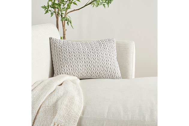 Fashioned in the style of your favorite chunky knit blanket, this comfy throw pillow from mina victory imparts cozy charm and warmth to your home. Curl up against its delightfully soft, quilted chevron face in suede-like polyester. The back is equally soft.Made of 100% cotton and polyester | Handcrafted | Soft polyfill | Zipper closure | Imported | Spot clean