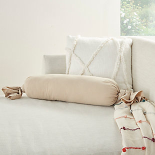 Have it soft, have it supportive, have it your way. This handcrafted bolster pillow from mina victory is both stylish and practical. It provides comfortable lumbar support while gracing your favorite chair or sofa with casual flair. Keep one in your home office to help fight back fatigue. The soft cotton cover is secured with hand-knotted ends for a trend-setting look, while the bolster's size adds interest to your pillow mix.Made of 100% cotton | Handcrafted | Soft polyfill | Imported | Spot clean