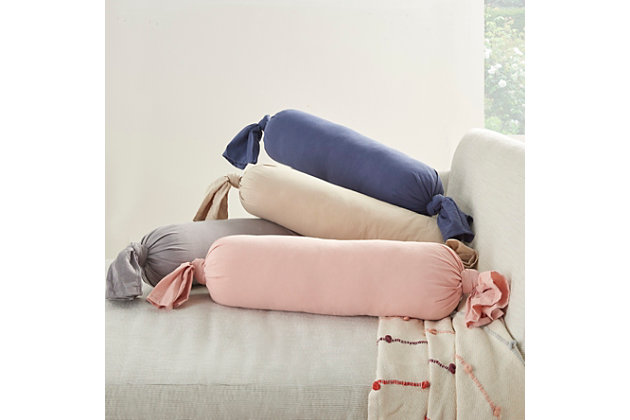 Have it soft, have it supportive, have it your way. This handcrafted bolster pillow from mina victory is both stylish and practical. It provides comfortable lumbar support while gracing your favorite chair or sofa with casual flair. Keep one in your home office to help fight back fatigue. The soft cotton cover is secured with hand-knotted ends for a trend-setting look, while the bolster's size adds interest to your pillow mix.Made of 100% cotton | Handcrafted | Soft polyfill | Imported | Spot clean