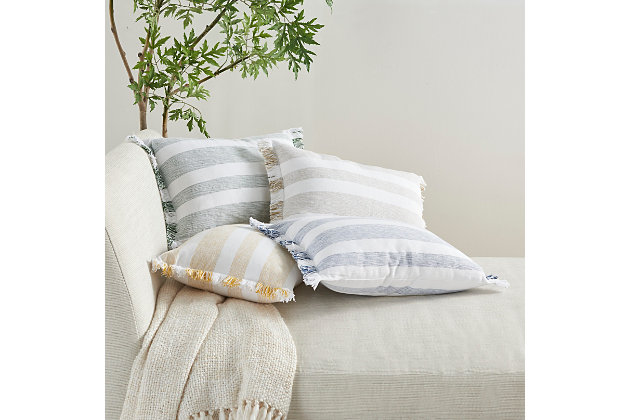 Refresh your room with the handcrafted, rustic appeal of this mina victory lumbar pillow in a nicely sized rectangle. Its bold stripes are chambray-woven for a casual effect that works beautifully in so many settings, from modern farmhouse to eclectic urban loft. This reversible pillow is striped front and back in neutral taupe on white, with a zipper closure and soft polyester insert. The removable cover is washable to keep that clean, fresh, country look.Handcrafted | Made of 100% cotton | Soft polyfill | Brush fringe border | Zipper closure | Imported | Machine wash