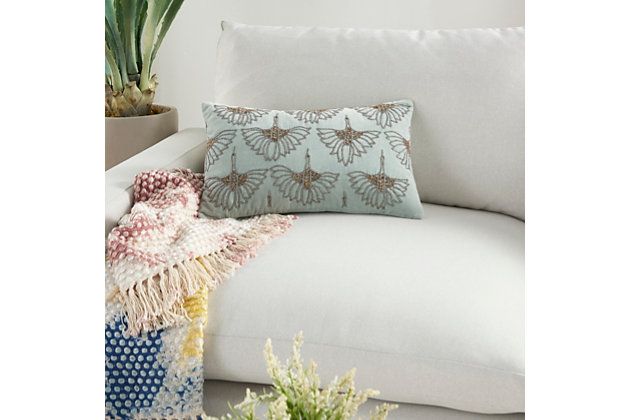 Art deco meets modern glam in this plush handmade mina victory lumbar pillow. Across its celadon green cotton cover, beaded floral motifs create a glamorous effect on your sofa, bed or chair. This lumbar pillow includes a springy polyester insert to help retain its rectangular shape, and a zipper closure for easy spot cleaning.Handcrafted | Made of 100% cotton | Soft polyfill | Zipper closure | Beaded floral motifs | Imported | Spot clean