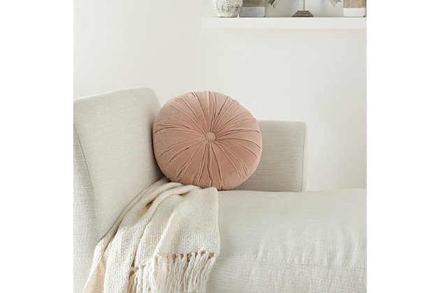 Indulge in the velvety-soft texture of this round throw pillow by mina victory. Its ruched cotton cover gives your living room or bedroom a beautiful and refined look. Crafted in a solid blush color, it fits seamlessly in boho-modern styles of decor. Toss this luxurious pillow on your sofa or bed for an instant uplift in elegance, or on the floor with other accent pillows for an extra comfy cushion. Includes zipper closure.Handcrafted | Made of 100% cotton; tufted cover | Soft polyfill | Zipper closure | Imported | Spot clean