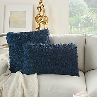 This funky shag pillow is the easiest way to add texture and a fresh style to any room. With its navy blue hue and ultra-plush texture, this modern mina victory throw pillow offers premier comfort and style. Elegant in its simplicity, its solid-toned face is handcrafted of soft, ribbon-style polyester shag with a velvety-soft polyester back. Includes a removable polyester insert.Handcrafted | Made of 100% polyester | Removable soft polyfill insert | Zipper closure | Imported | Spot clean