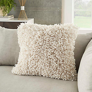 This funky shag pillow is the easiest way to add texture and a fresh style to any room. With its cream tone and ultra-plush texture, this modern Mina Victory throw pillow offers premier comfort and style. Elegant in its simplicity, its solid-toned face is handcrafted of soft, ribbon-style polyester shag with a velvety-soft polyester back. Includes a removable polyester insert.Handcrafted | Made of 100% polyester | Removable soft polyfill insert | Zipper closure | Imported | Spot clean