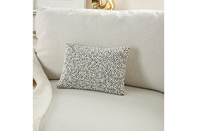 Jewelry for your rooms. Take your decor to the next level by tossing this mina victory lumbar pillow onto your couch or chair. Its polyester cover is covered in shimmering silvertone and ivory faux pearls for a look that is ultra-luxe. This glam lumbar pillow is handmade of polyester and includes a removable polyester insert with zipper closure.Handcrafted | Made of 100% polyester | Soft polyfill insert | Covered in silvertone and ivory faux pearls | Pattern appears on face only | Zipper closure | Imported | Spot clean
