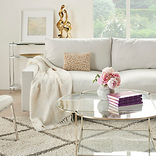 Jewelry for your rooms. Take your decor to the next level by tossing this mina victory lumbar pillow onto your couch or chair. Its polyester cover is covered in shimmering goldtone and ivory faux pearls for a look that is ultra-luxe. This glam lumbar pillow is handmade of polyester and includes a removable polyester insert with zipper closure.Handcrafted | Made of 100% polyester | Soft polyfill insert | Covered in goldtone and ivory faux pearls | Pattern appears on face only | Zipper closure | Imported | Spot clean